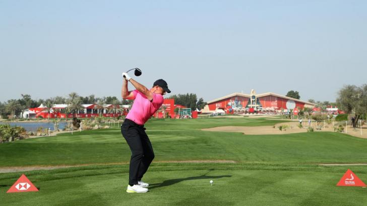 Rory McIlroy playing golf in Abu Dhabi